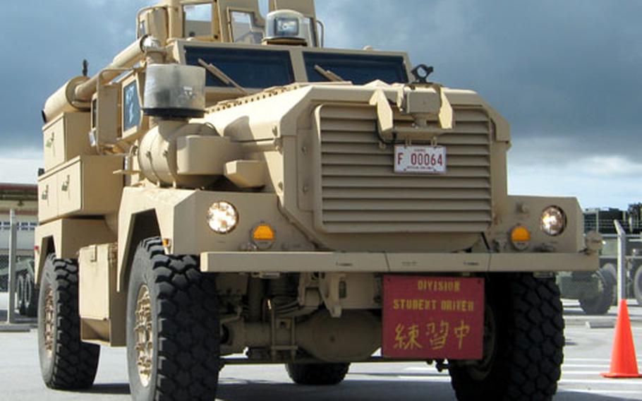 Nineteen MRAPS arrived on Okinawa in May, and Marines began training with them on Camp Hansen in October.