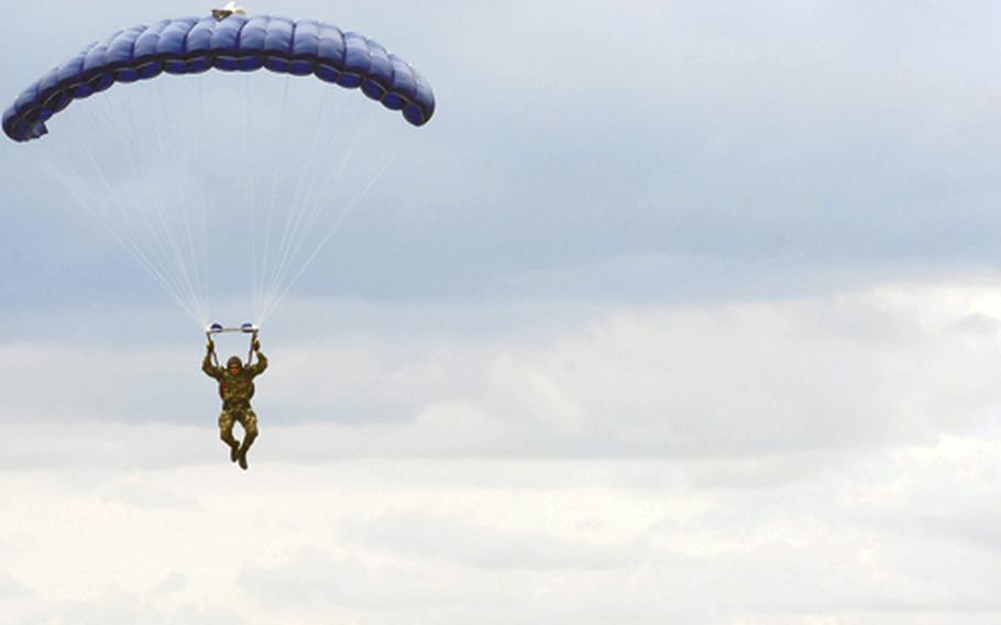 Petty Officer 1st Class James Endicott parachutes through the sky during a HALO jump near Yambol in southeastern Bulgaria.