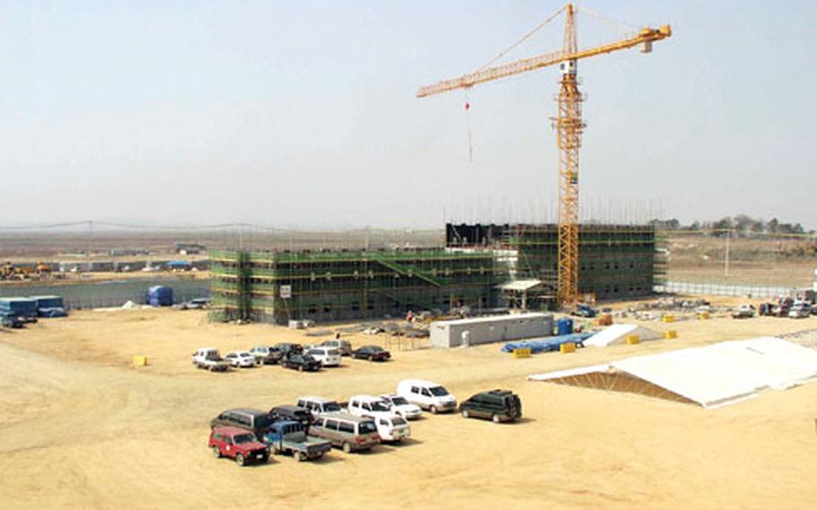 Six eight-story barracks rise at Camp Humphreys in April 2009 as part of the post's expansion to become the U.S. military’s main installation in South Korea. 