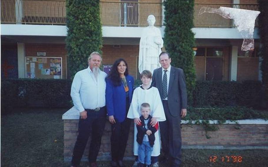 Jonathan with his parents, grandfather and nephew at his Catholic confirmation at the St. Louis the King Catholic Church, which held the funeral services after Jonathan’s suicide. Teachers from the church’s school, which both Jonathan and his mom attended, were at the funeral.