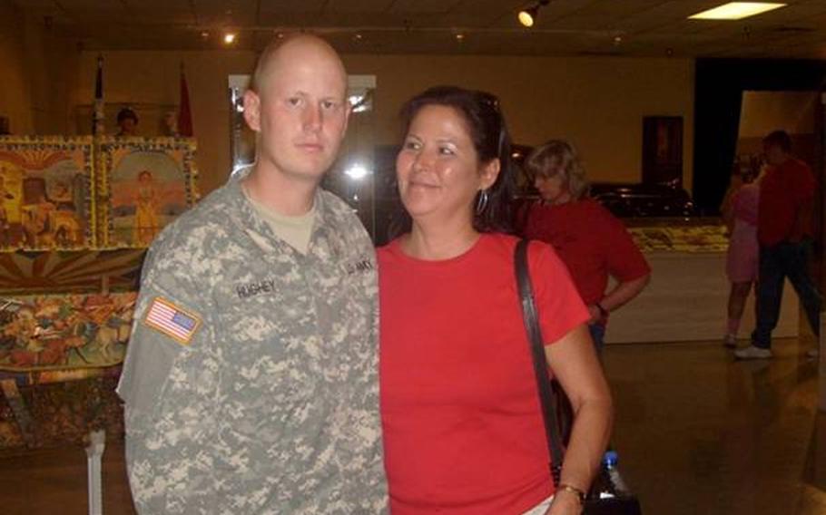 Jonathan with his Mom, Jeanette Baker, after graduating from basic training.