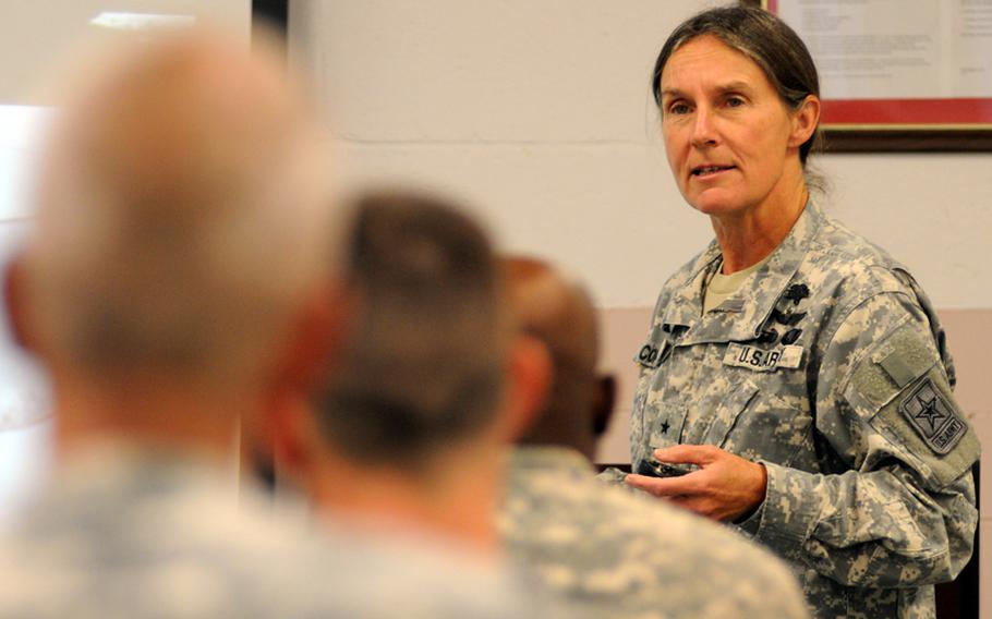 A former prisoner of war, Brig. Gen. Rhonda Cornum is now director of the Comprehensive Soldier Fitness program. Here, she speaks before a Master Resilience Training course at Fort Meade, Md.