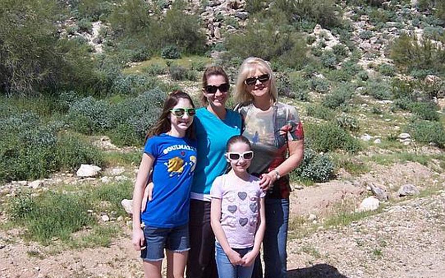 Since Caldwell's deployment, the family has spent more time together and taken more vacations together, like this one last spring at White Tank Regional Park in Arizona. Pictured here are: Ivie Caldwell (far left), Erin Caldwell, Debbie Nichols, and Bailey Caldwell (front).