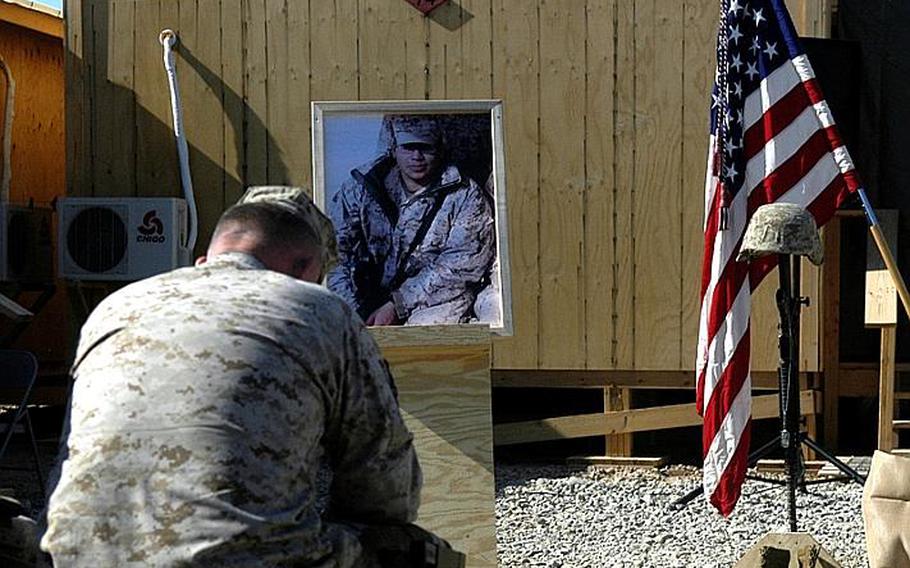 Brig. Gen. Larry Nicholson, commander of Marine Expeditionary Brigade-Afghanistan, mourns during a memorial for Lance Cpl. Mark Juarez, on Jan. 19.