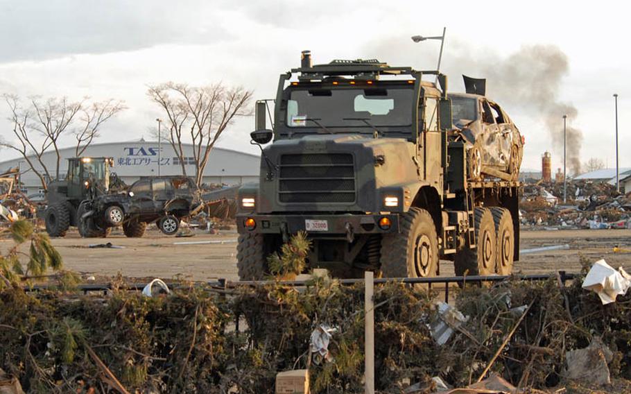 The U.S. Military continues to assist in the clearing of the Sendai Airport in Sendai, Japan that was severly damaged after the 9.0 earthquake and resulting tsunami hit the area. U.S. forces have cleared the runway of hundreds of wrecked cars and other debris enabling the airport to receive humanitarian aid.