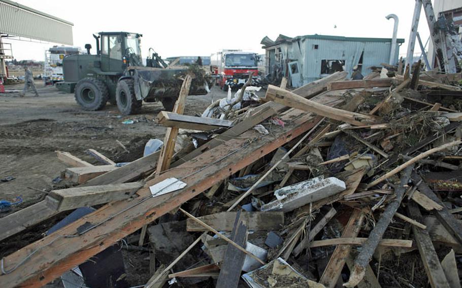 The U.S. military have assisted in the clearing of the Sendai Airport in Sendai, Japan that was severly damaged after the 9.0 earthquake and resulting tsunami hit the area. U.S. forces have cleared the runway of hundreds of wrecked cars and other debris enabling the airport to receive humanitarian aid.
