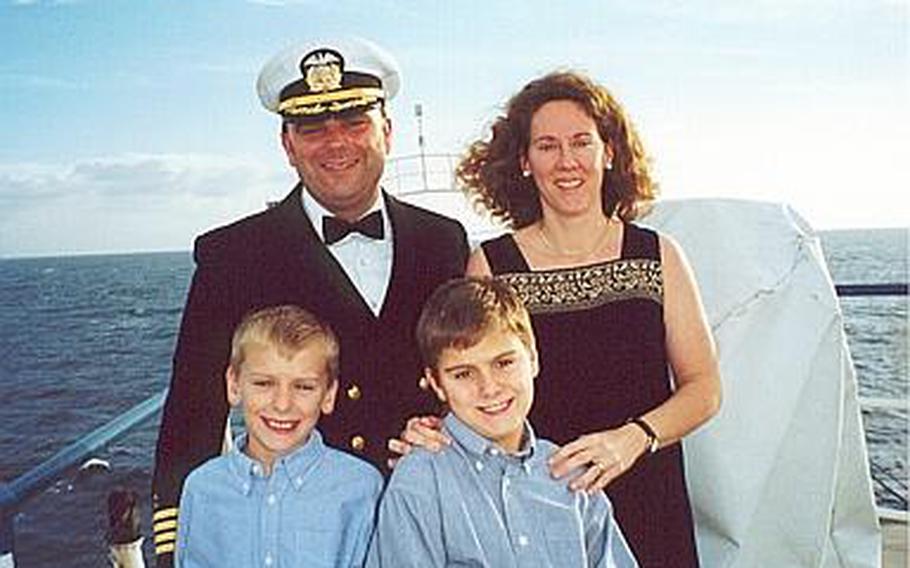 The entire Ketchum family, seen here at a formal event aboard the MV Anastasis in October 2001, is now on active duty in the U.S. military. Brothers Will and Benjamin Ketchum, front row, are now cadets at the U.S. Military Academy. Clement Ketchum, who was then the ship's captain, is now an active-duty Army lieutenant colonel, and Jennifer Ketchum is a Coast Guard commander on active duty in Liberia.