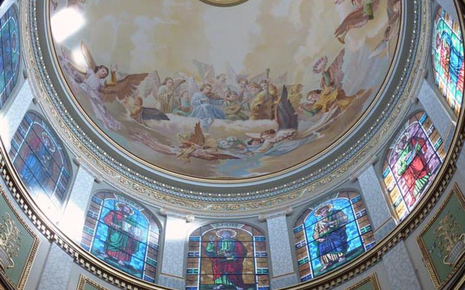 The dome of the sanctuary at Tindari. The 12 apostles are represented in the stained-glass windows.