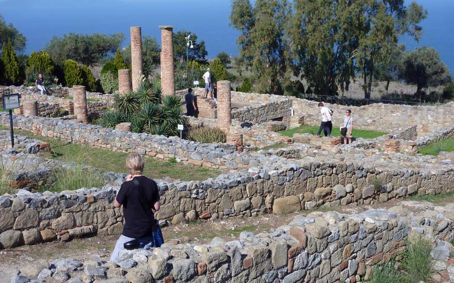 Tourists roam the archaeological  excavations of ancient Tyndaris. It was founded around 396 B.C. by Greek settlers, and existed through Roman times.