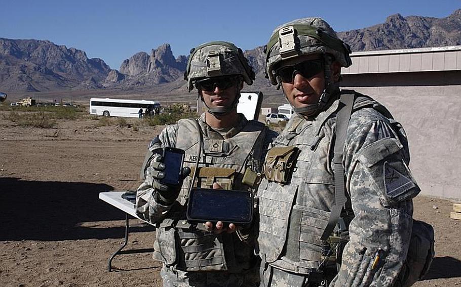 Nett Warrior shows soldiers an overhead view of the battlefield on LCD screens of either a smartphone or a tablet computer (the radios to which the devices are connected are not visible in this photo, taken Nov. 16, 2011.) An earlier, more complex version of Nett Warrior was killed after soldiers at the Army's Network Integration Exercise deemed it too cumbersome.