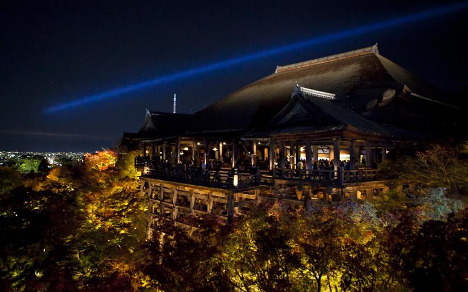 A view from the Kiyomizudera temple in Kyoto, Japan at night.