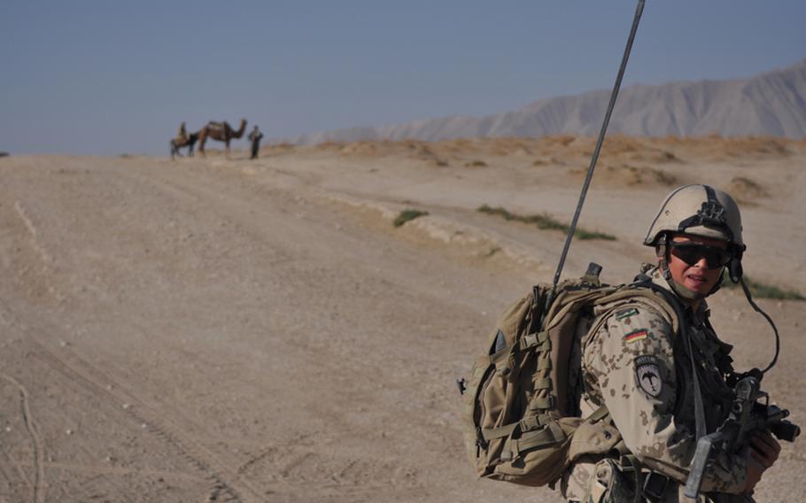 A German soldier from Platoon B, 2nd Infantry Company, Task Force Kunduz, patrols the Char Dara district in Kunduz province in October. During the last few years, German forces in northern Afghanistan have seen some of their most intense combat since the end of World War II. Last year, three soldiers were killed on the same day in Char Dara.