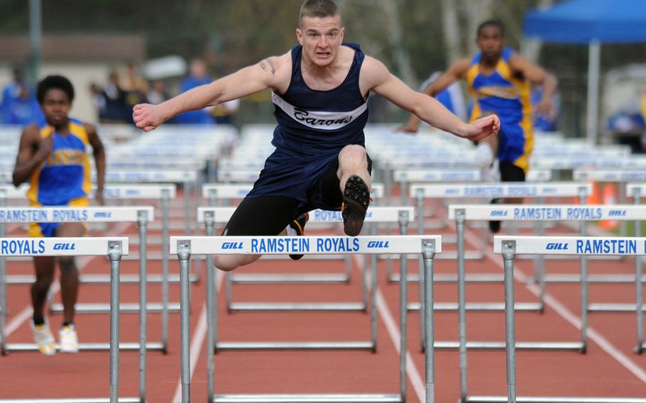 Bitburg's L.J. Downey clears the final hurdle on his way to winning the 110-meter event in Ramstein on Saturday in 16.08 seconds.
