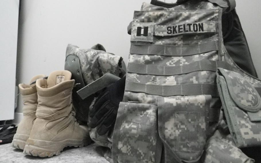 Boots and body armor belonging to Capt. D.J. Skelton.