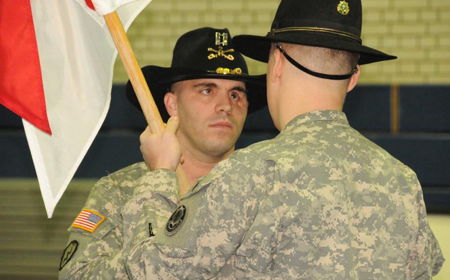 Capt. D.J. Skelton relinquishes command of Comanche Troop, 1st Squadron, 2nd Stryker Cavalry Regiment on Jan. 27. Skelton was badly wounded in Iraq in November 2004, but recovered to rejoin the infantry and take command in Afghanistan last year.