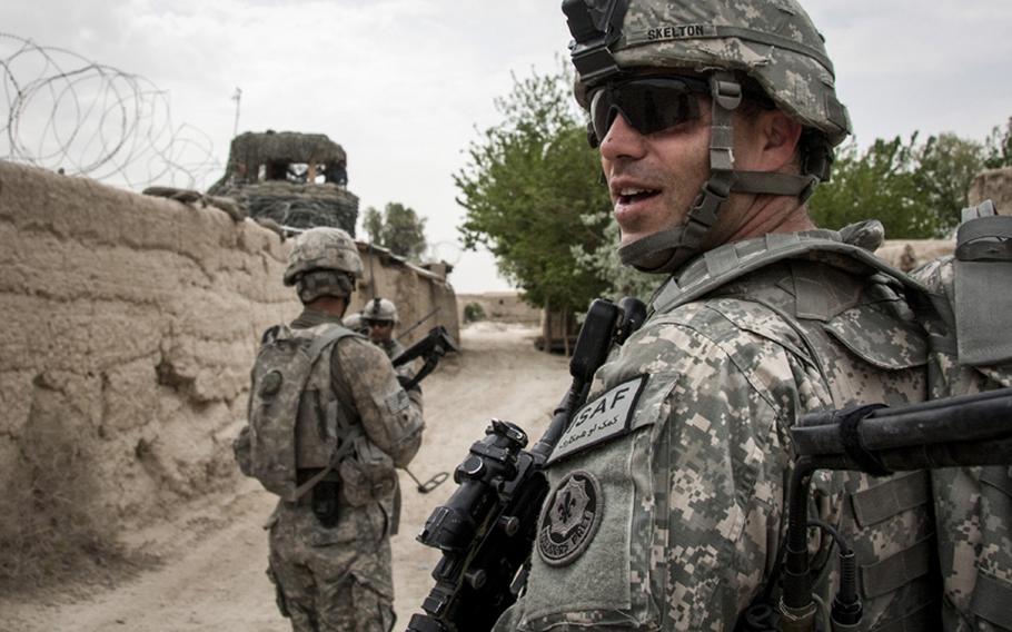 Capt. D.J. Skelton, the commander of Commanche Company, 1st Squadron, 2nd Stryker Cavalry Regiment leads a patrol through the village of Nakhonay in Panjwayi district, Kandahar province, Afghanistan, on April 7, 2011.  Skelton is considered the most wounded U.S. soldier to return to combat. He sustained severe injuries, including the loss of one eye, in Fallujah, Iraq, in 2004.