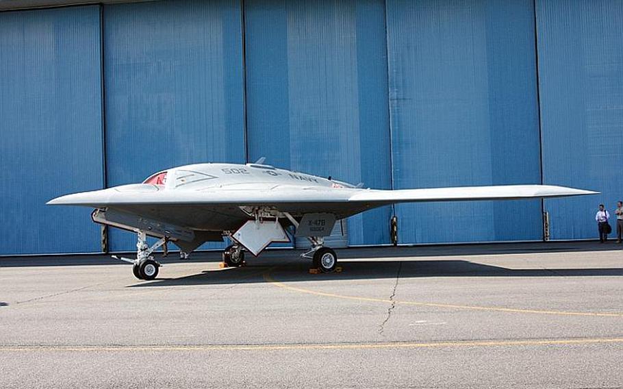 The Navy predicts that its experimental autonomous drone, the Northrop-Grumman X-47B, shown last week at Naval Air Station Patuxent River in Maryland, will conduct its first autonomous takeoff and landing from a carrier in 2013.