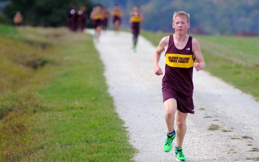 Vilseck's Michael Nelson trails in second place behind his brother, Ben Nelson, during a cross country run at Vilseck on Saturday. Michael Nelson finished second with a time of 18 minutes, 28 seconds.