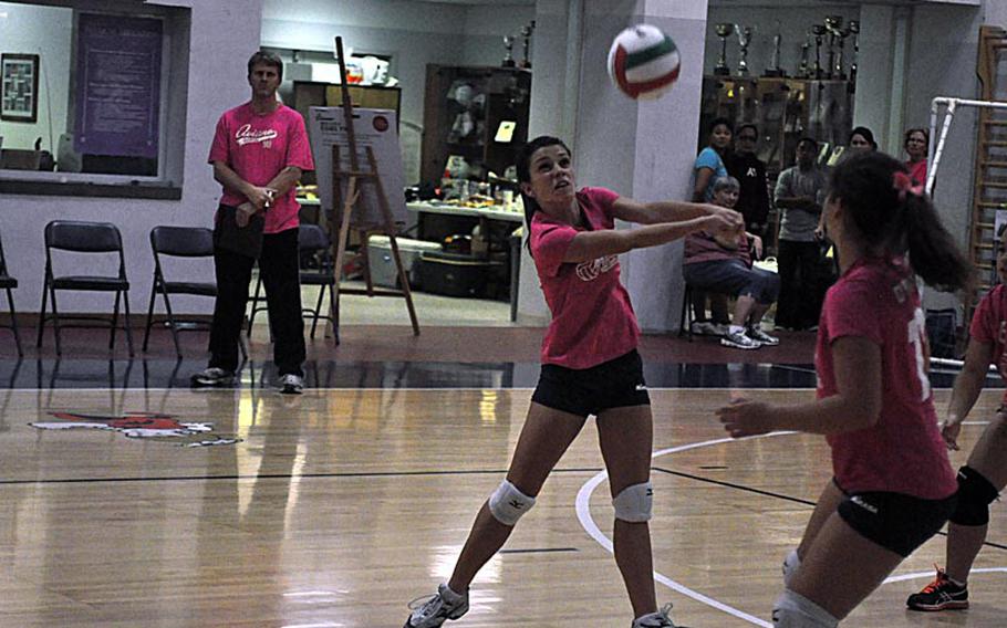 Aviano&#39;s Giulia Silvi starts her team&#39;s offense by sending the ball from the back row to the front in the Saints&#39; 25-14, 33-31, 25-15 loss to the American Overseas School of Rome.