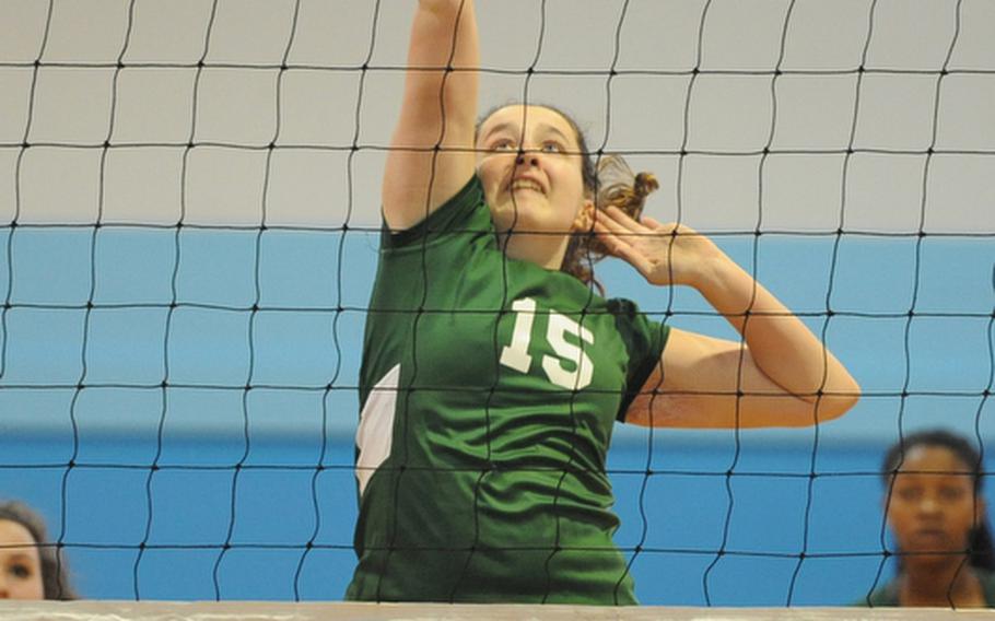 Ankara's Clara Hamilton hits the ball over the net in a Division III match against Alconbury at the DODDS-Europe volleyball championships. Alconbury won 25-15, 17-25, 25-17.