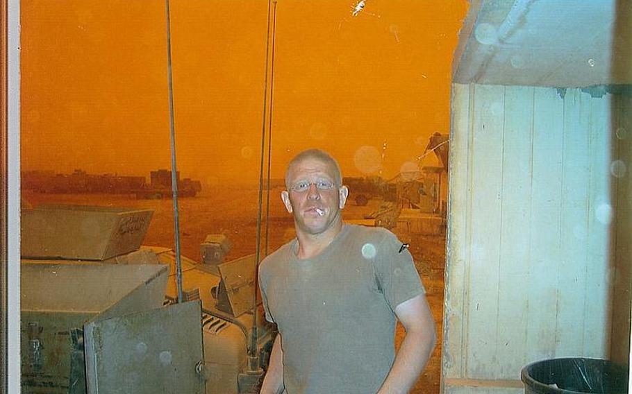 Spc. Erik Schei poses in Iraq during his second tour there. Working as gunner in a humvee during a mission, he was shot in the head by an armor-piercing bullet.
