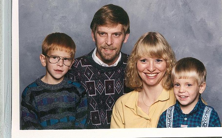 Erik Schei, right, and his little brother, Deven Schei, with their parents Gordon and Christine Schei, in the early 1990s.