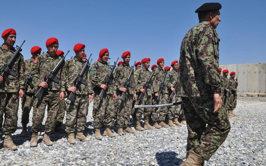 An honor guard practices before a ceremony marking the handover of Parwan Prison from U.S. to Afghan control in March 2013. 