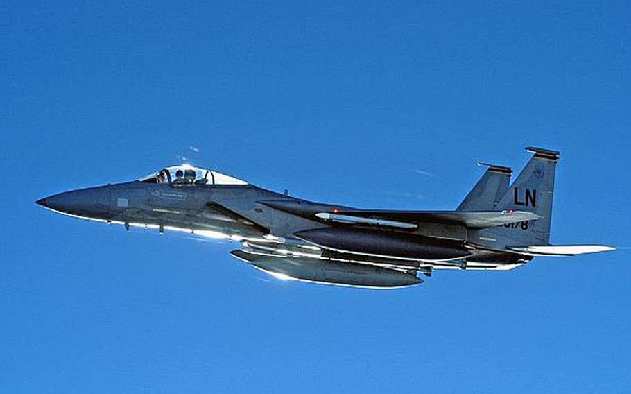 A U.S. Air Force F-15 from RAF Lakenheath, England, flies the skies above Europe after refueling from a KC-135R Stratotanker. More than a dozen Air Force fighter squadrons were grounded Tuesday at U.S. bases around the world confront the effects of steep defense budget cuts brought on by sequestration.