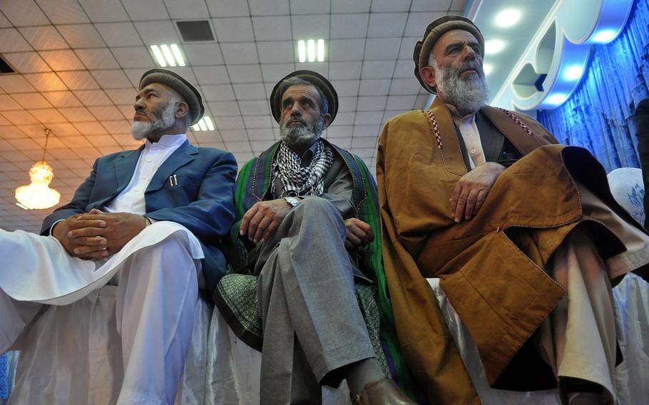 Former mujahedeen Feroz Omaidwar, left, Mohammad Ali, and Abdul Malik Hamwar joined hundreds of other former fighters, as well as younger admirers at an event commemorating the Soviet withdrawal from Afghanistan in the 1980s.