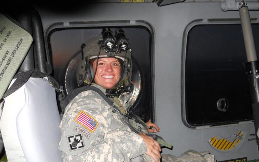 Army Staff Sgt. Nicole Hopkins, in Afghanistan before she was injured.