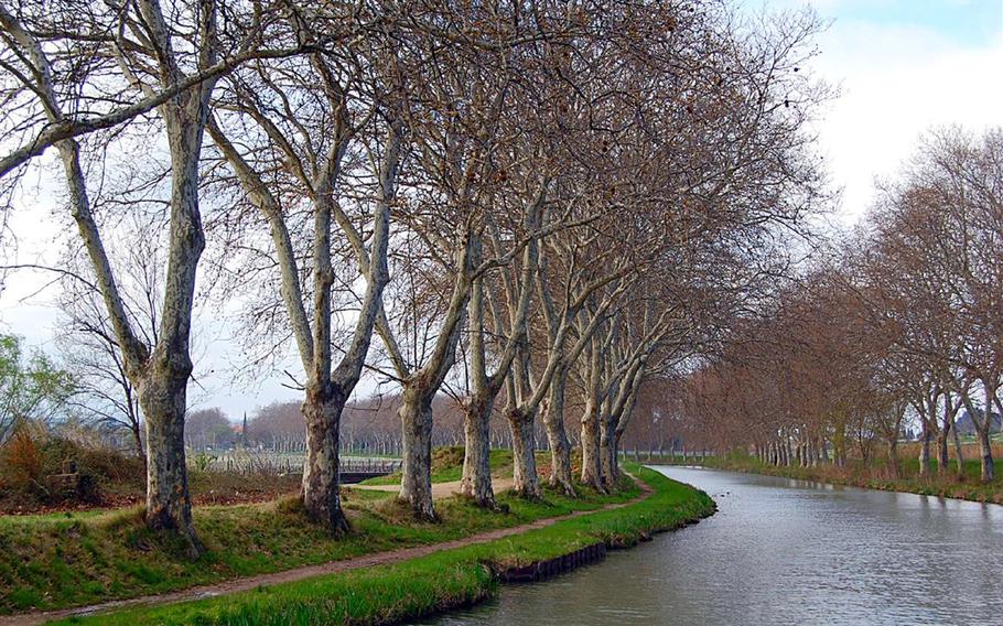 Footpaths along the Canal du Midi in France stretch from the Atlantic to the Mediterranean Sea and are popular with hikers and bicyclists.