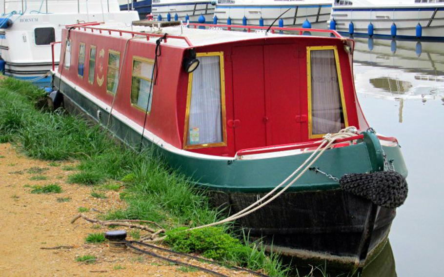 Vessels of all types, including this narrow boat from the United Kingdom, can be found along the banks of the Canal du Midi in France.