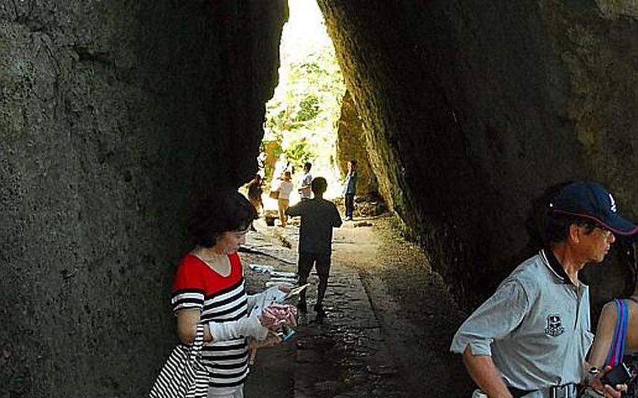 Sefa Utaki's distinctive natural tunnel leads to the holiest altar on Okinawa.