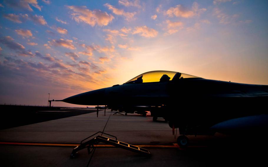 A U.S. Air Force F-16C Fighting Falcon from the New Jersey Air National Guard's 177th Fighter Wing "Jersey Devils," at sunrise on Sept. 11, 2013. The 177th was one of the first Air National Guard units to respond to the terrorist attacks on Sept. 11, 2001.