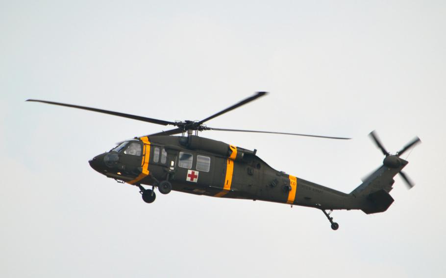 U.S. Army UH-60 Black Hawk medical evacuation helicopter flies over Camp Humphreys, South Korea on Oct. 10, 2013.