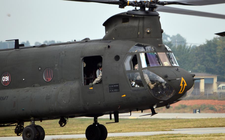 U.S. Army CH-47 Chinook taxis to its parking sport at Camp Humphreys, South Korea on Oct. 10, 2013.