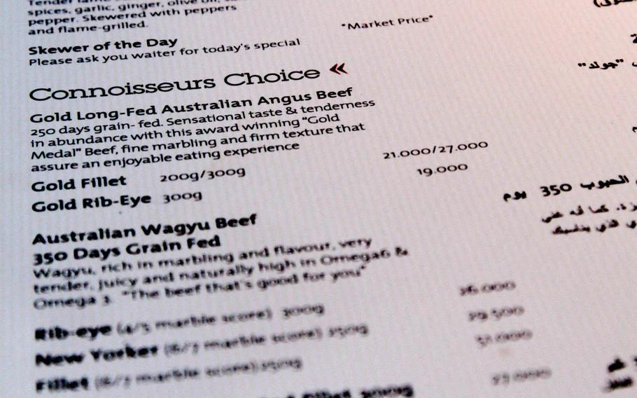 The menu at The Meat Co offers a variety of cuts of South African, Australian and USDA steaks. However, these high-quality steaks are pricey. Prices on the menu pictured here are in Bahraini Dinar.