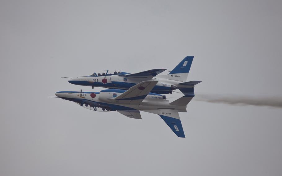 The Japan Air Self-Defense Force's Blue Impulse exhibition team performs a stunt during Friendship Day festivities at Marine Corps Air Station Iwakuni, Japan, May 5, 2010. The Blue Impulse are scheduled to perform again on Nov. 3 at Iruma Air Base, weather permitting.