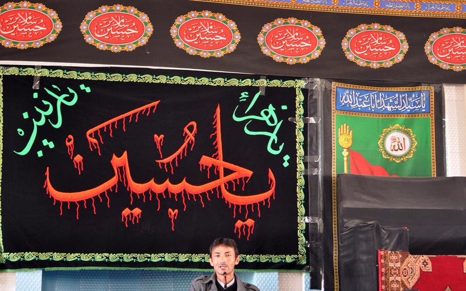 An imam gives an Ashura sermon Thursday at a mosque in Bamiyan, Afghanistan. Ashura is a day of mourning for Shia Muslims, commemorating the martyrdom of Hussein Ibn Ali, grandson of the prophet Muhammad. Observances of the day are more tame in Afghanistan than in parts of the Middle East, where Shias will sometimes flog themselves bloody.