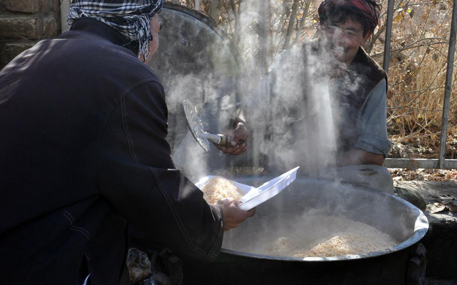 Volunteers prepare food for hundreds of faithful who gathered for Ashura serivices in Bamiyan, a city high in the mountains of central Afghanistan and a stronghold of the country's Shia Hazara minority. Ashura is a day of mourning for Shia Muslims, commemorating the martyrdom of Hussein Ibn Ali, grandson of the prophet Muhammad.