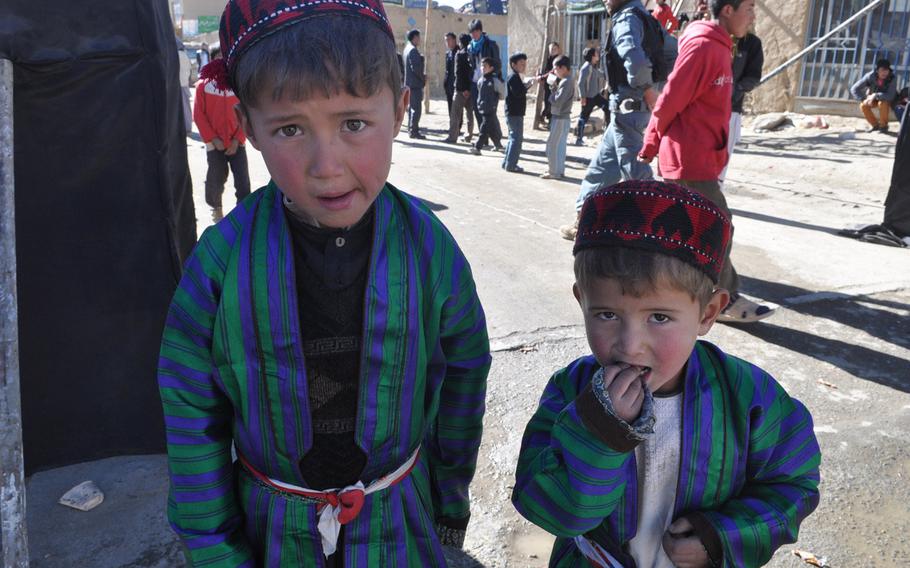 Children dressed up for Ashura services Thursday in Bamiyan, Afghanistan. Ashura is one of the holiest days of the year for Shia Muslims, and Bamiyan, high in the mountains of central Afghanistan, is a stronghold of the country's Shia Hazara minority.