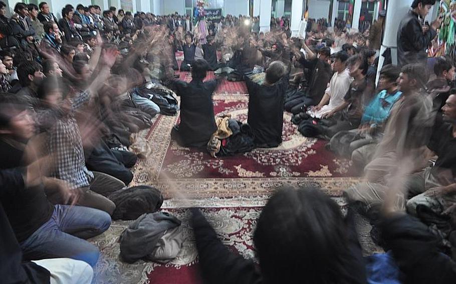 Worshipers at a mosque in Bamiyan, Afghanistan beat their chests to mourn the killing of Hussein Ibn Ali, grandson of the Muslim prophet Muhammad. The ritual is part of Ashura, one of the holiest days of the year for Shia Muslims. 