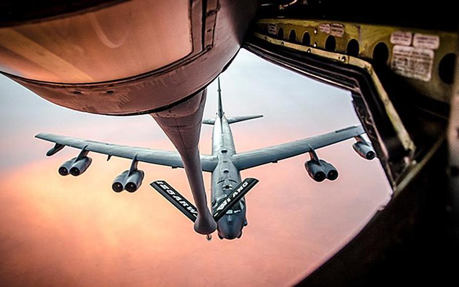 Members of an Air Force KC-135 Stratotanker crew refuel a B-52 Stratofortress during a training exercise. The crew is assigned to the 128th Air Refueling Wing, Milwaukee, Wisc. The mission of the 128th ARW is to transfer fuel to aircraft, to provide medical evacuation, and to airlift personnel and equipment to strategic locations in a cost-effective manner.