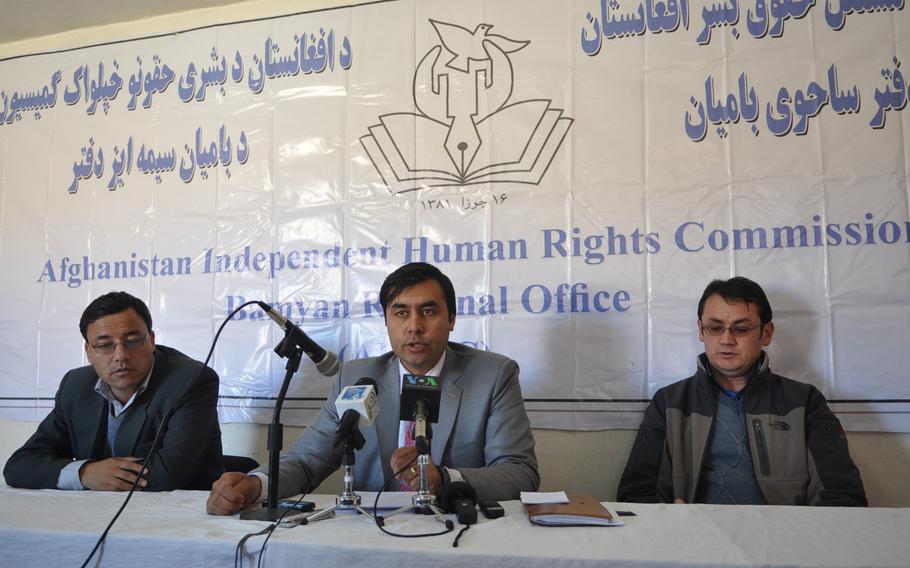 Ruhullah Frogh, center, head of the Human Rights Commission's Bamiyan office, holds a news conference to urge Afghanistan's Independent Election Commission to greatly increase the number of polling stations in high elevation areas to allow voters in snowbound villages access to voting.