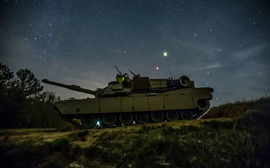 An M1A2SEP Abrams tank from Company D, 1st Battalion, 64th Armor Regiment "Desert Rogues," sits ready at Red Cloud Range, Dec. 6, 2013. The unit was conducting Gunnery Table V, the practice phase before the final qualification phase, Gunnery Table VI.