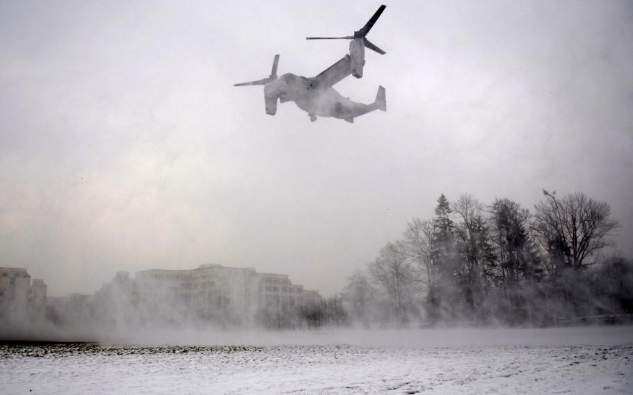 An MV-22B Osprey, assigned to the 26th Marine Expeditionary Unit out of Camp Lejeune, N.C., kicks up snow as it lands in a field on U.S. Africa Command's Kelley Barracks in Stuttgart, Germany. The aircraft was in Stuttgart in March for a four-day visit focused on showcasing the Ospreys' capabilities to senior leaders at U.S. European and Africa Commands.