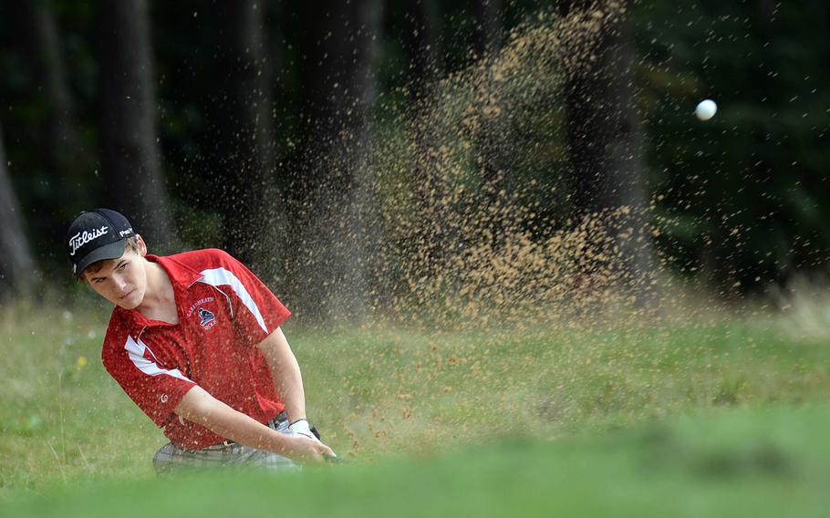 Lakenheath's Kyler Zachary hits out of a bunker on the first day of the DODDS-Europe golf championships in Wiesbaden, Germany, Wednesday, Oct. 9, 2013.