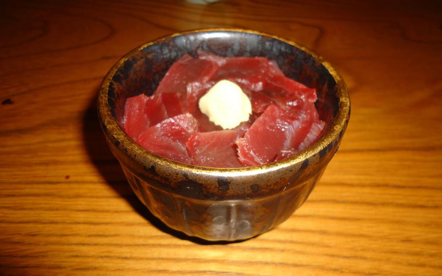 A maguro don, which is basically pieces of cut-up raw tuna on top of rice with wasabi, costs just 600 yen and is a delicious starter dish.
