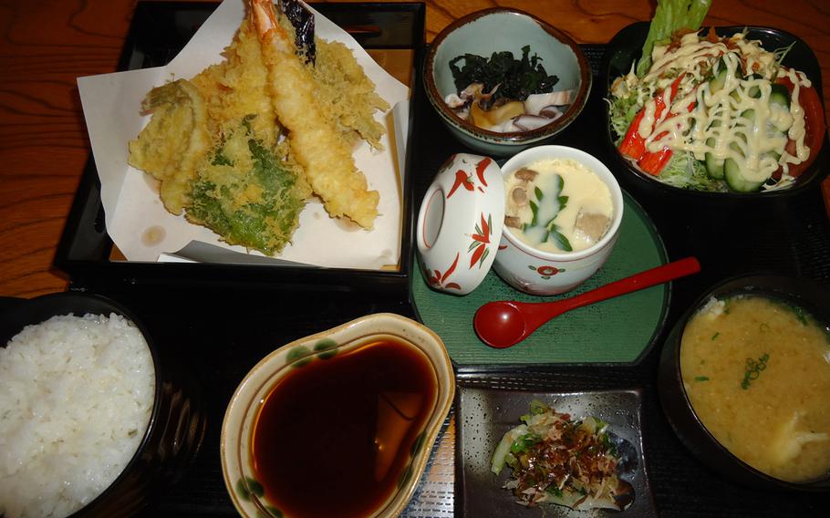 Yutaka Zushi's tempura set comes with rice, soup, salad, and multiple other side dishes all for 1,500 yen. The tempura was light and fluffy and comes highly recommended.