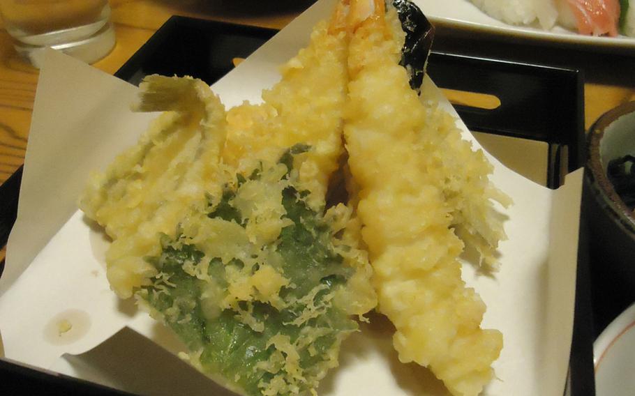 Yutaka Zushi is the perfect place to take a date or conclude a special day trip to Hirado. Yutaka Zushi features the highest quality in the area at affordable prices. Tempura in the foreground and sushi and miso soup in the background.
